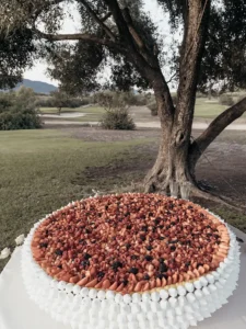catering gallery wedding cake with red fruits
